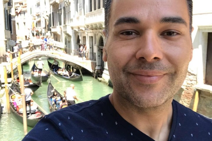 a man smiling for the camera