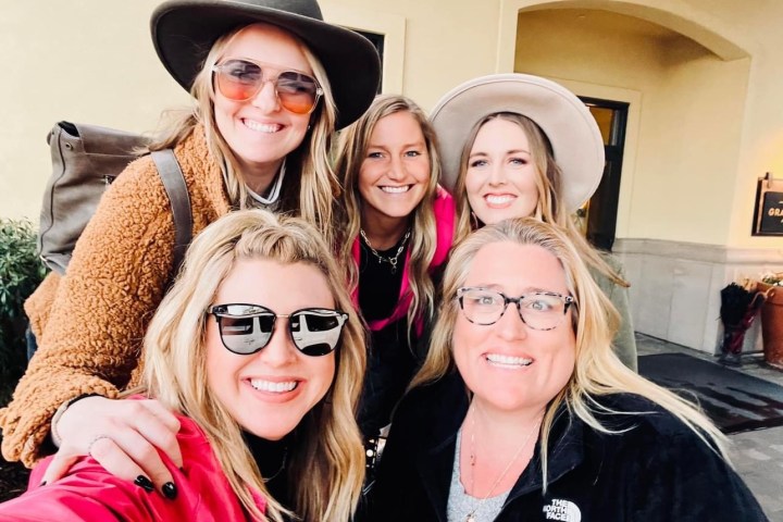 a group of people posing for the camera