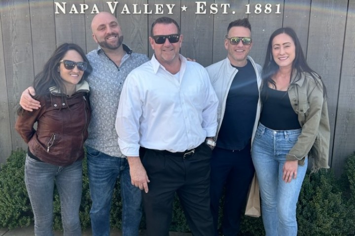 a group of people posing for a photo