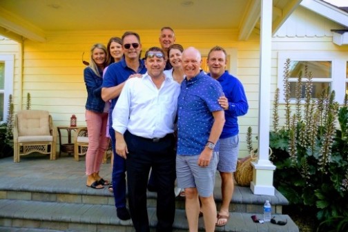 a group of people posing for the camera