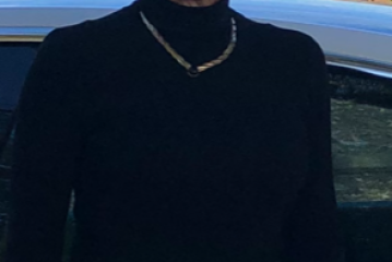 a person standing in front of water