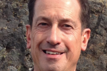 a man smiling for the camera