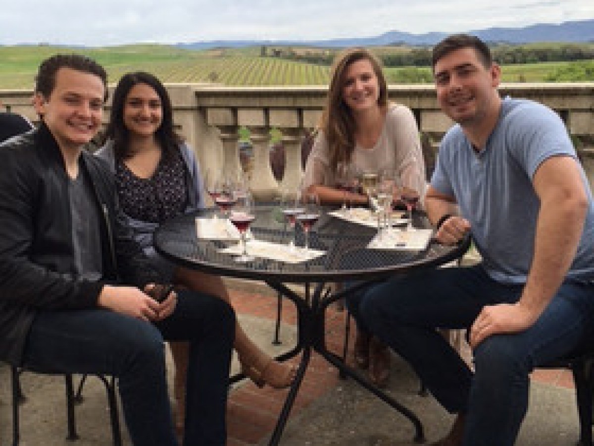 a group of people sitting at a table